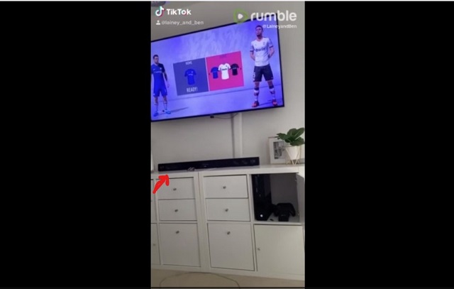While person plays game, the objects in front of him move on their own.