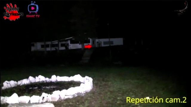 Durban Paranormal-Featuring Terror Al Extremo-Shadowy apparition appears to walk at a distance across the door entrance
