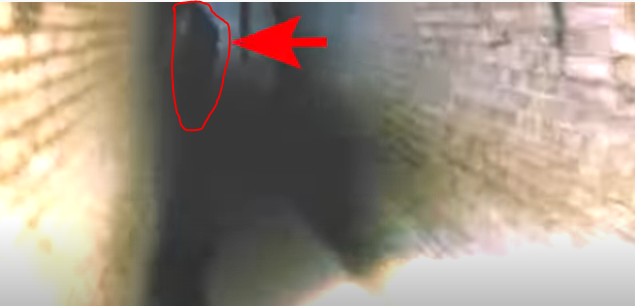 YouTube: Steve Ballard, caught a shadow like figure walking across the underground tunnel hallway.