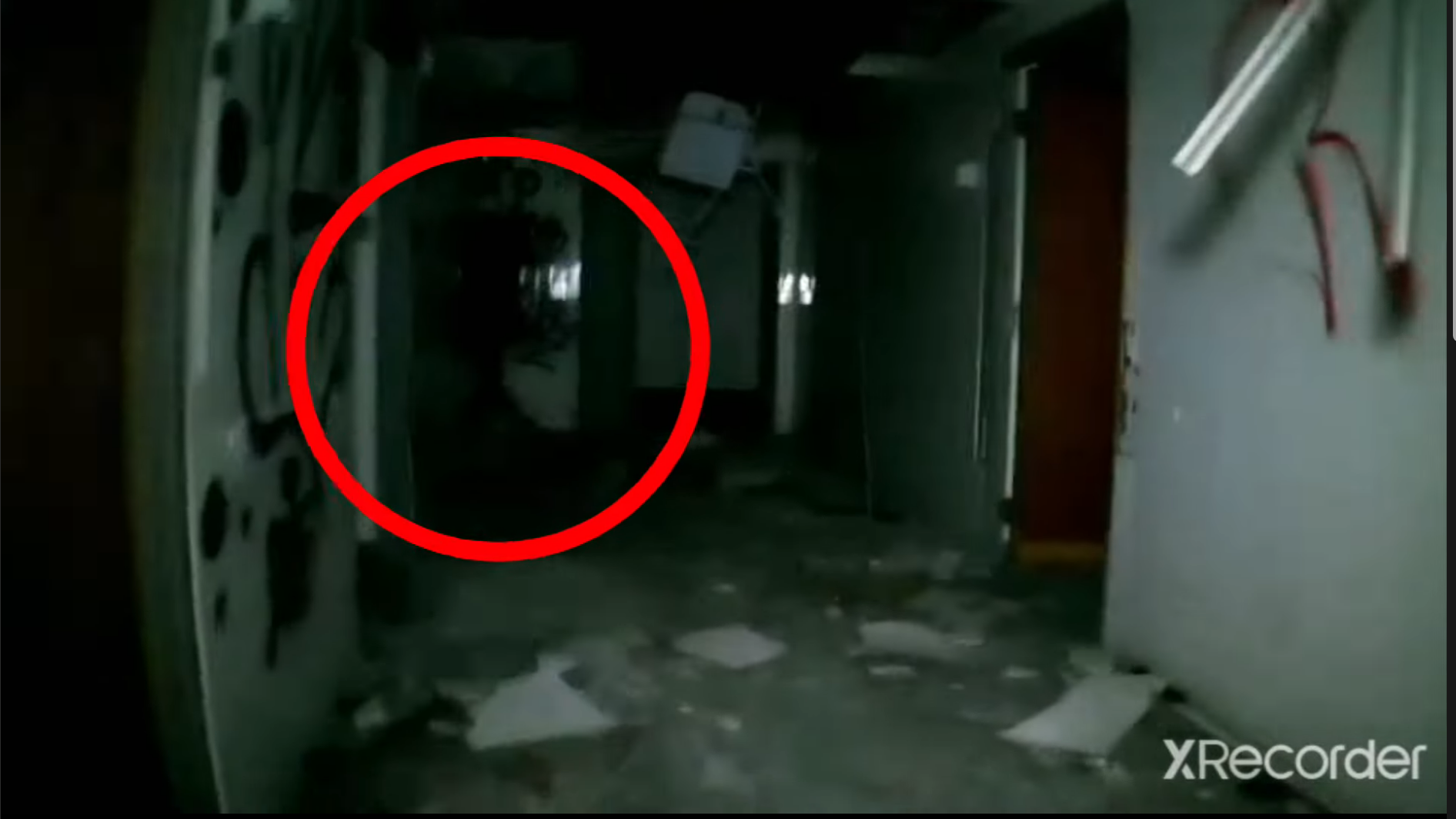 While investigating an abandon building, the camera capture what appears to be an apparition of a person walking away.