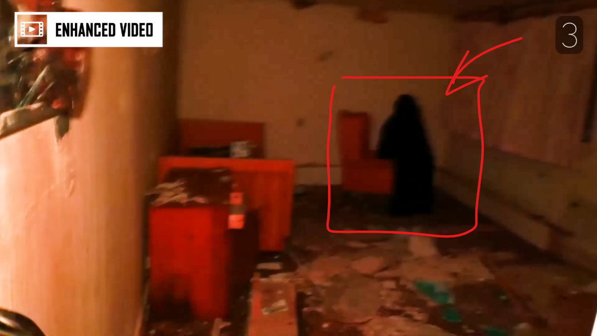 Explorer scans around in the hallway, when a dark, shadowy figure is caught on camera.