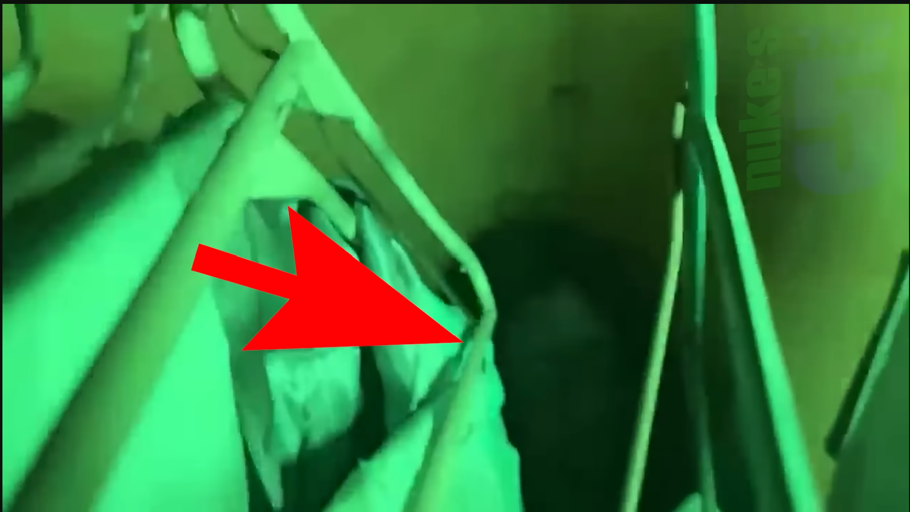 While investigating an abandon building, Ricky Velazquez and his girlfriend, hear a voice answer back, and he catches an apparition behind a clothes rack.