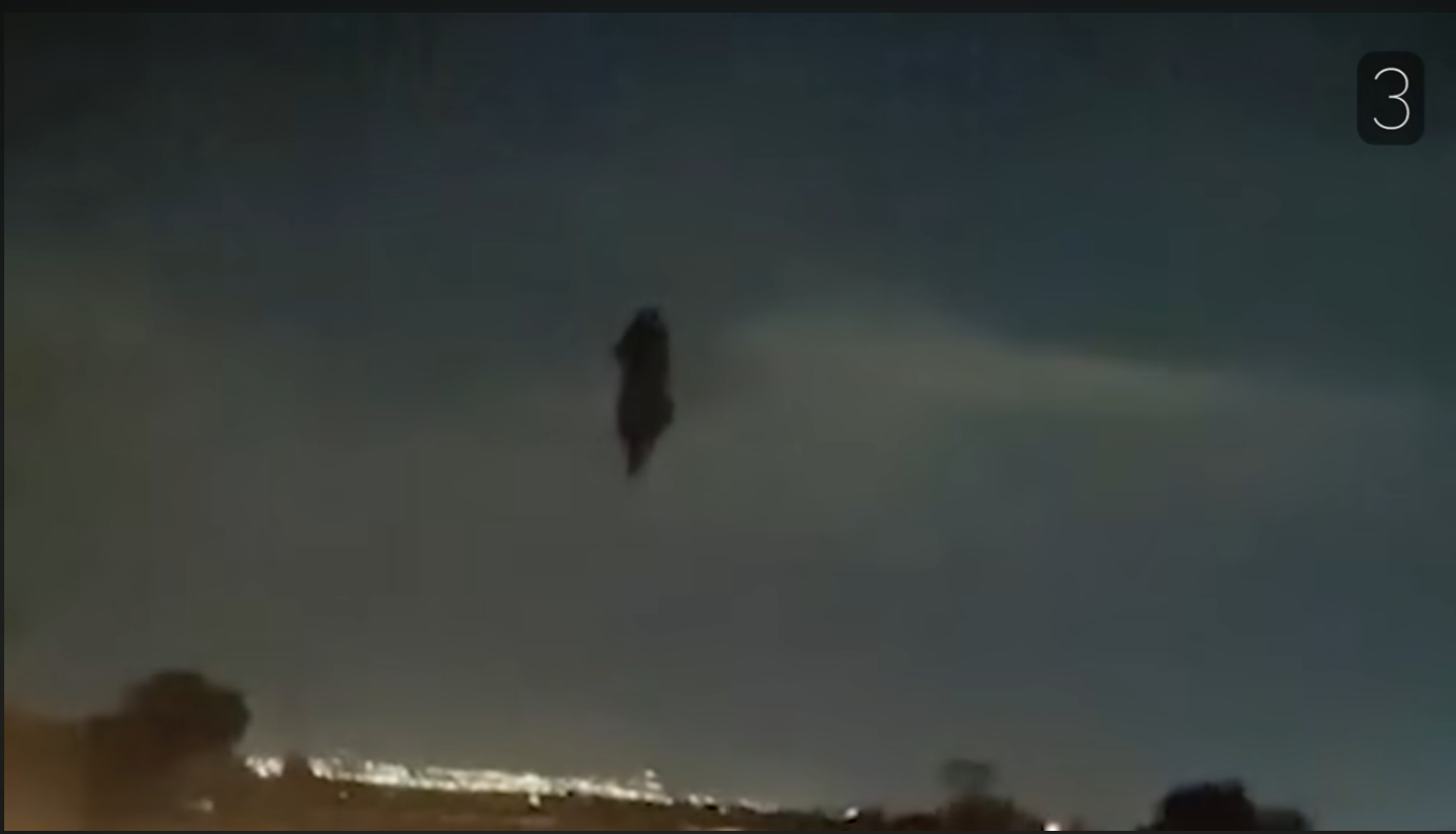 Source is unknown, but while we can see in the video, it is being recorded in a car dash camera, and what appears to have recorded a witch suspended in the air?