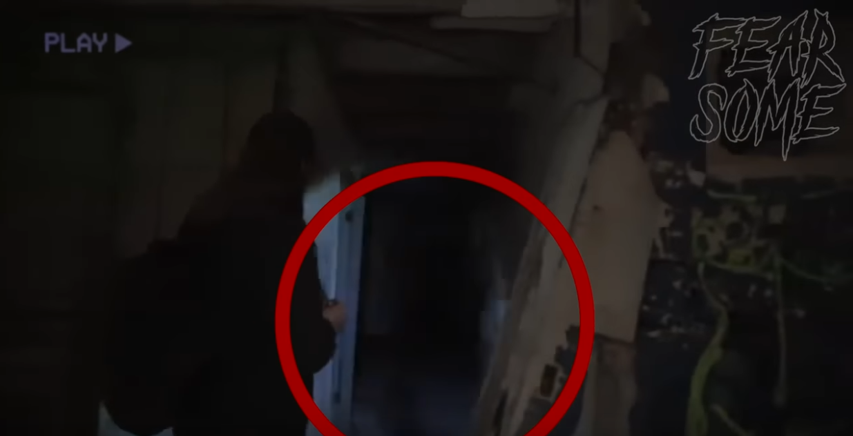Fearsome Top 5 video snippet. Jade from Ghost Club Paranormal is investigating an abandon building when she captured what appears a shadowy entity flying across another investigator looking down the hallway.