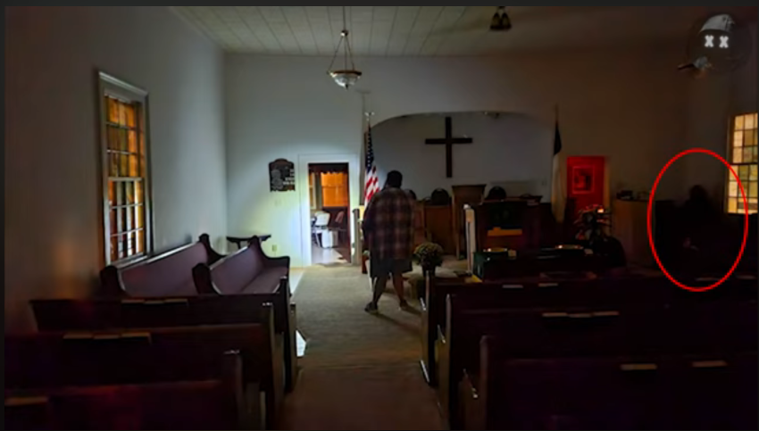 SignsSignals go back to the church, when they take a photo session, and they captured what appears to be a shadowy figure.